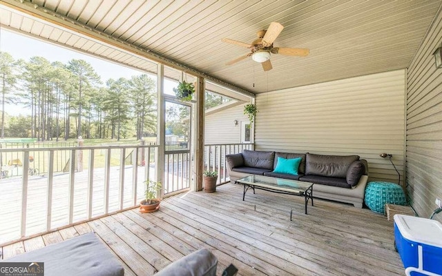 sunroom / solarium with ceiling fan