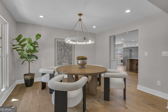 dining room with light wood-type flooring