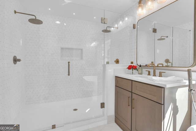 bathroom with vanity and an enclosed shower