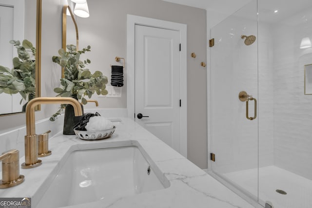 bathroom with vanity and walk in shower