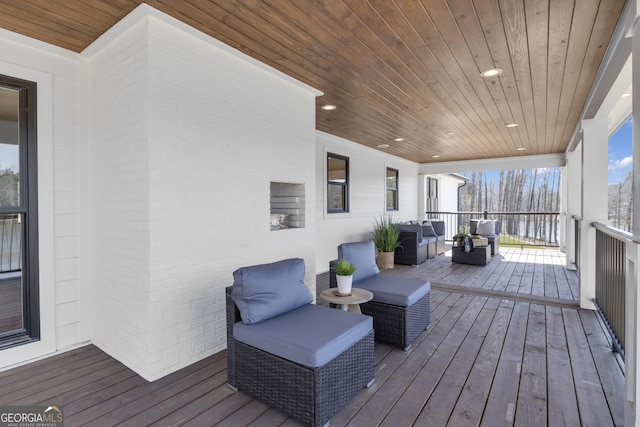 deck featuring outdoor lounge area