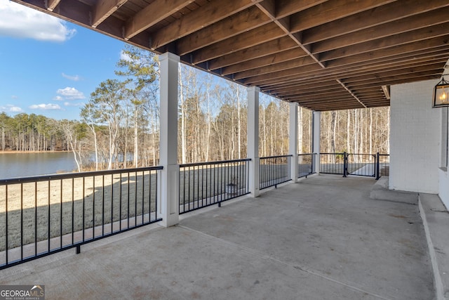 view of patio featuring a water view