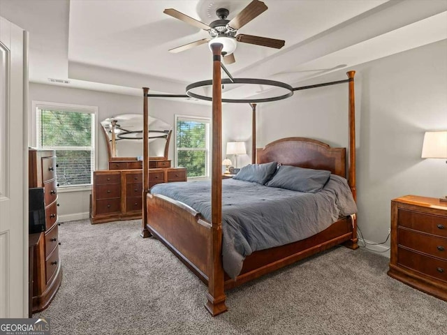 bedroom with ceiling fan and carpet