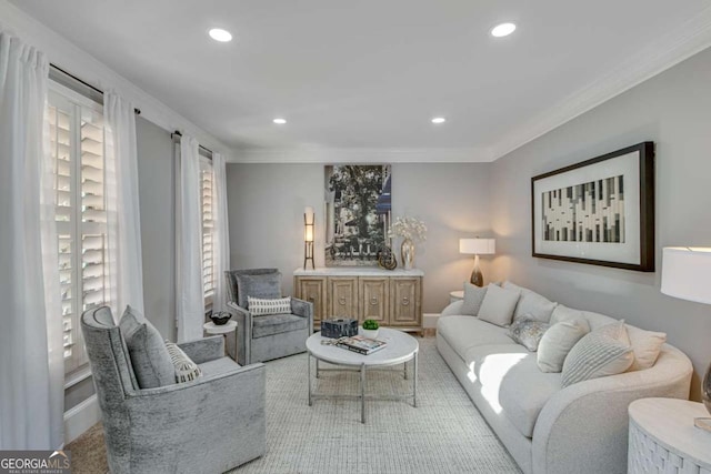 living room with ornamental molding and plenty of natural light