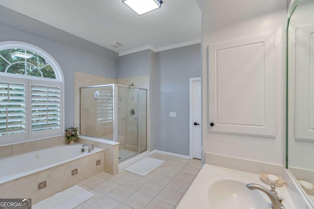 bathroom featuring vanity, ornamental molding, tile patterned floors, and shower with separate bathtub