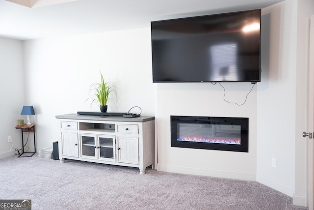 unfurnished living room with light carpet