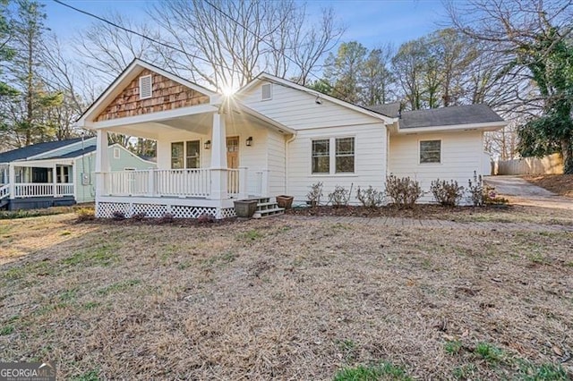 view of front of home featuring covered porch