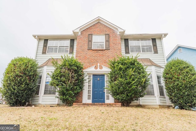 view of front of home with a front yard