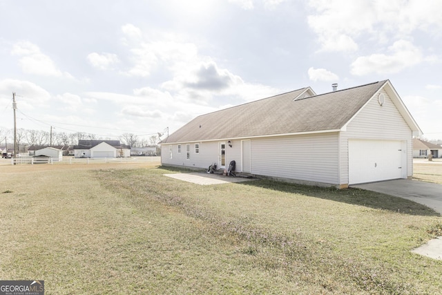 view of side of home featuring a lawn