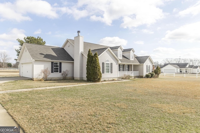 cape cod house featuring a garage, covered porch, and a front lawn