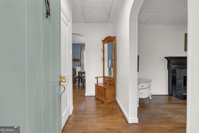 corridor with dark hardwood / wood-style floors