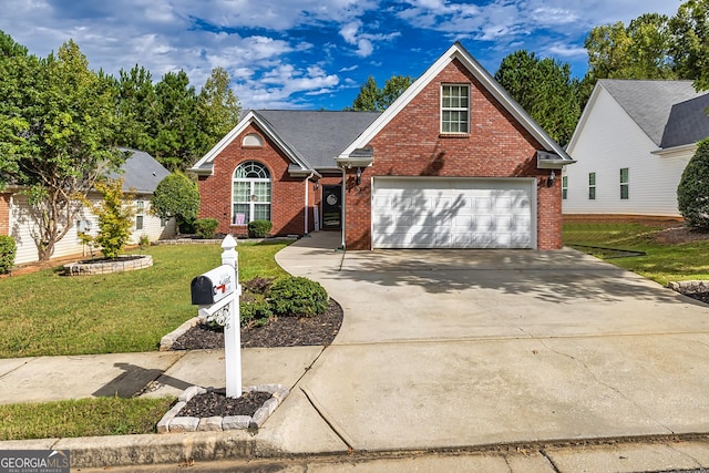 front facade with a garage and a front yard