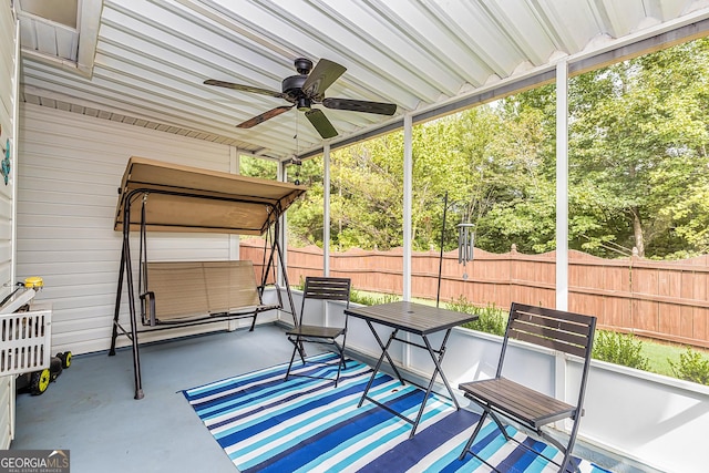 sunroom / solarium with ceiling fan