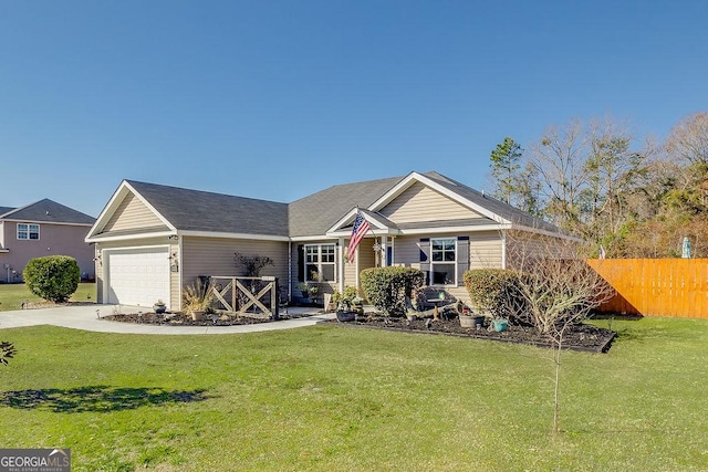 view of front facade with a garage and a front yard