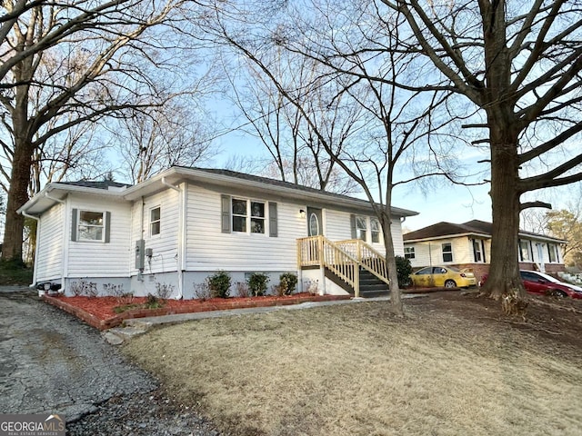 view of front of house with a front yard