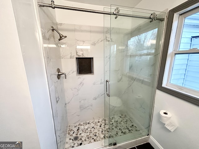 bathroom with walk in shower