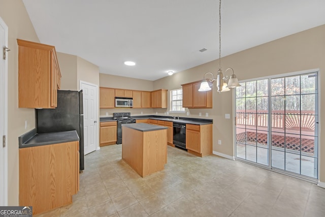 kitchen with a kitchen island, sink, hanging light fixtures, black appliances, and an inviting chandelier