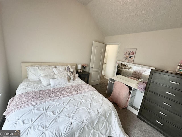 bedroom featuring lofted ceiling, dark carpet, and a textured ceiling