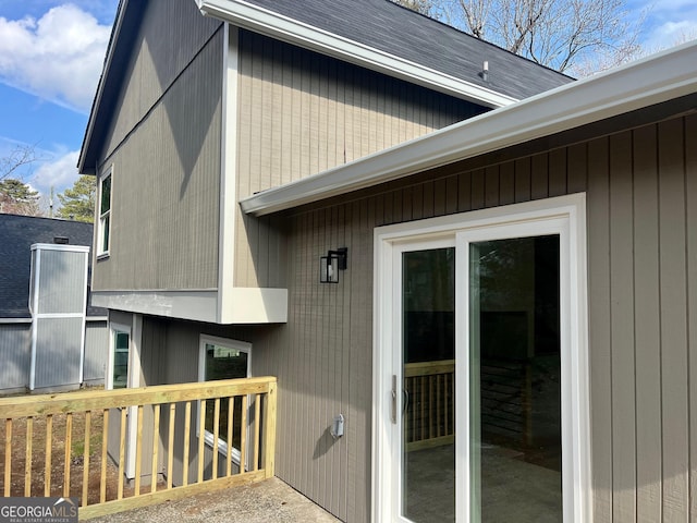 view of side of home featuring a deck