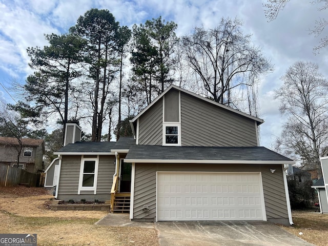 view of front of property with a garage