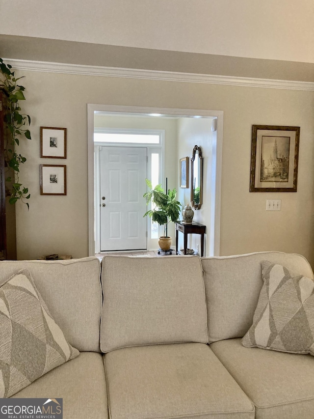 living room featuring ornamental molding