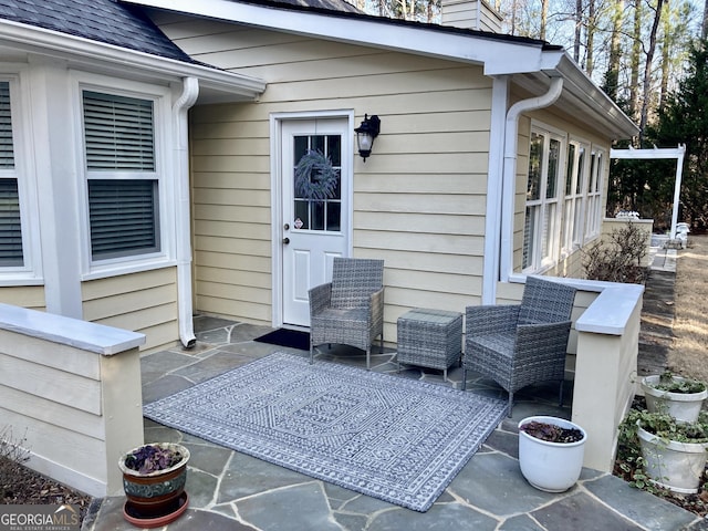 exterior space with an outdoor living space and a patio area