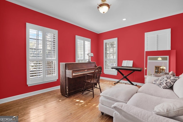 64 Lake No No Rd, Midway, GA 31320 - living area with wood finished floors, ornamental molding, and recessed lighting