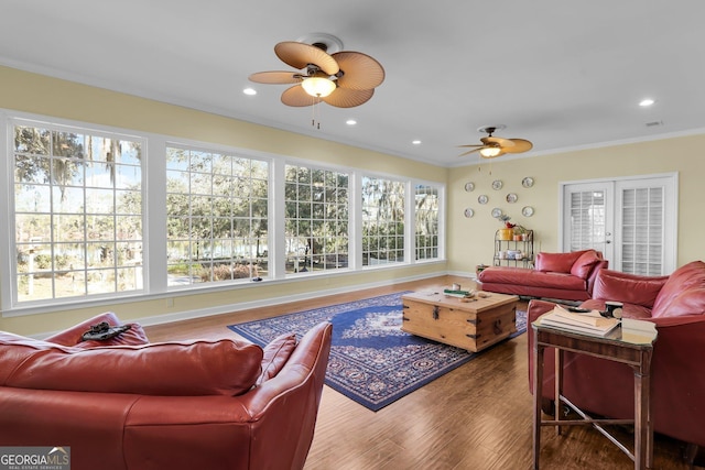 64 Lake No No Rd, Midway, GA 31320 - living room featuring crown molding, ceiling fan, hardwood / wood-style floors, and french doors