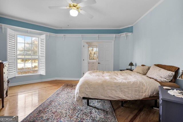 64 Lake No No Rd, Midway, GA 31320 - bedroom featuring crown molding, light hardwood / wood-style flooring, and ceiling fan