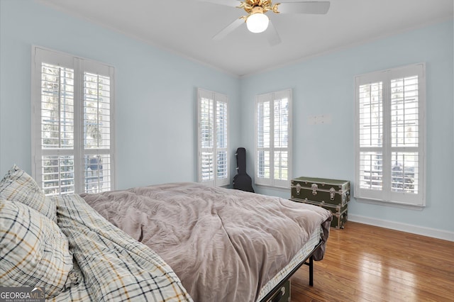 64 Lake No No Rd, Midway, GA 31320 - bedroom featuring wood-type flooring and ceiling fan