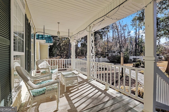 64 Lake No No Rd, Midway, GA 31320 - view of wooden porch