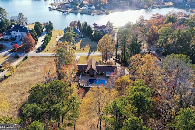 drone / aerial view with a water view