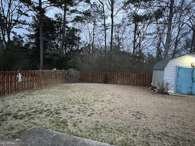 view of yard with a storage shed