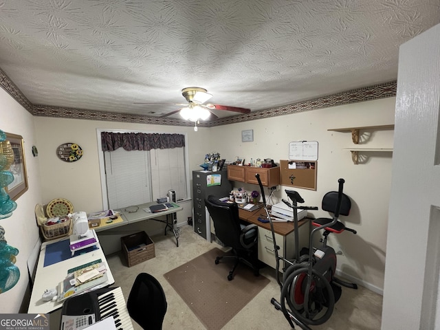 office space with ceiling fan and a textured ceiling