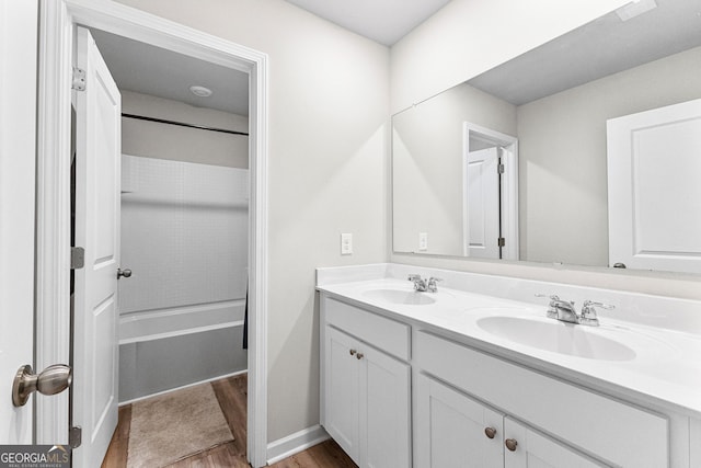 bathroom with wood-type flooring and vanity