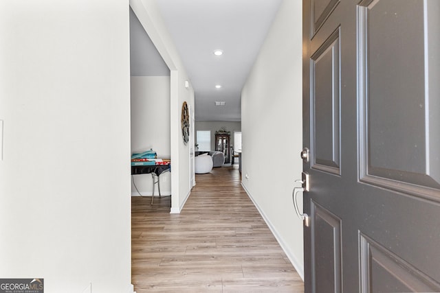 corridor featuring light wood-type flooring