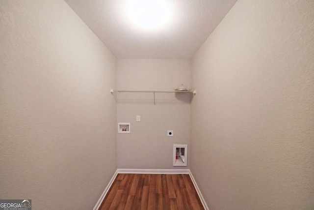 washroom with electric dryer hookup, hookup for a washing machine, and dark hardwood / wood-style floors