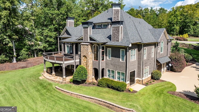 exterior space featuring a yard and a deck