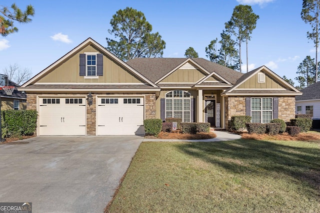 craftsman-style home with a garage and a front lawn