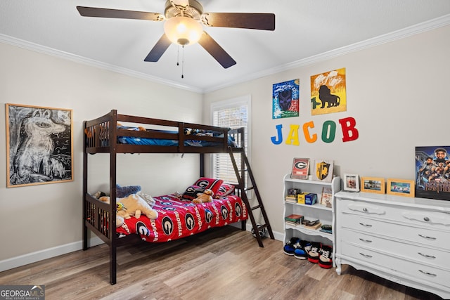 bedroom featuring crown molding, ceiling fan, and light wood-type flooring