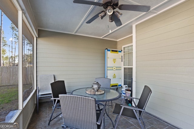 sunroom / solarium with ceiling fan