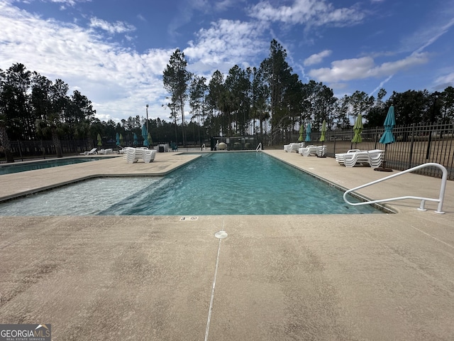 view of pool with a patio area