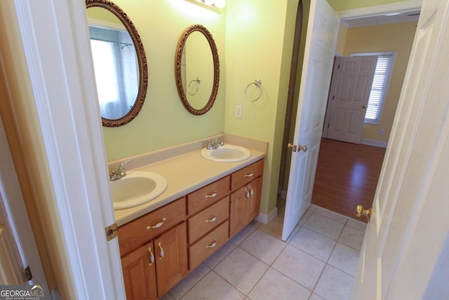 bathroom with vanity and tile patterned floors