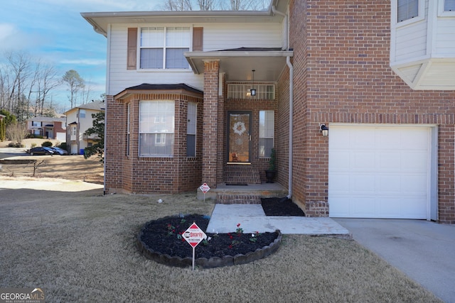 entrance to property featuring a garage