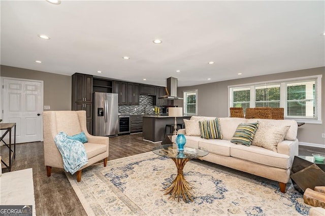 living room featuring dark wood-type flooring and wine cooler