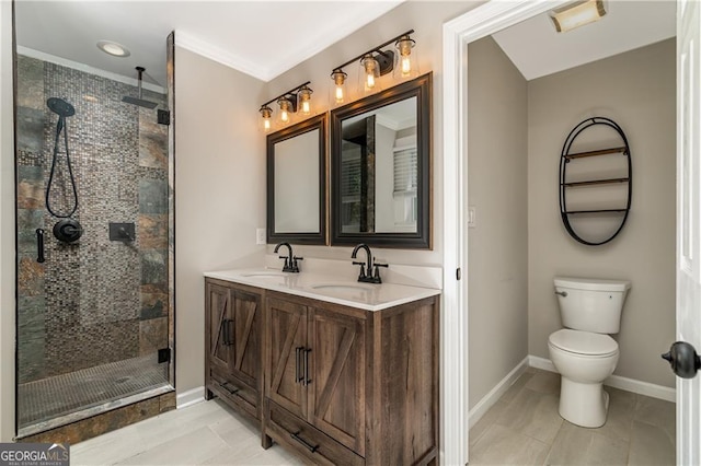 bathroom featuring vanity, toilet, and walk in shower