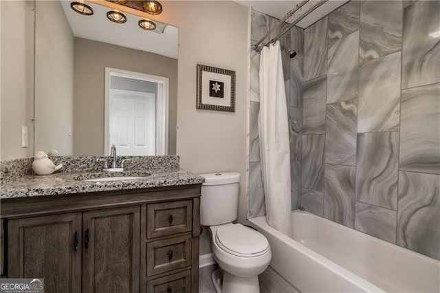 full bathroom featuring vanity, toilet, and shower / tub combo with curtain