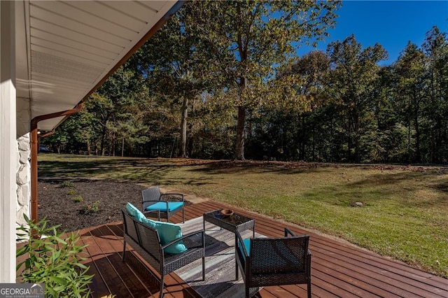 wooden terrace with an outdoor hangout area and a lawn