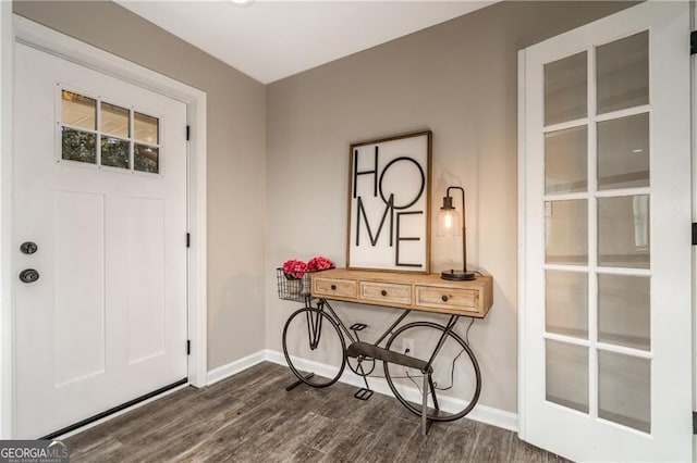 entrance foyer with dark hardwood / wood-style floors