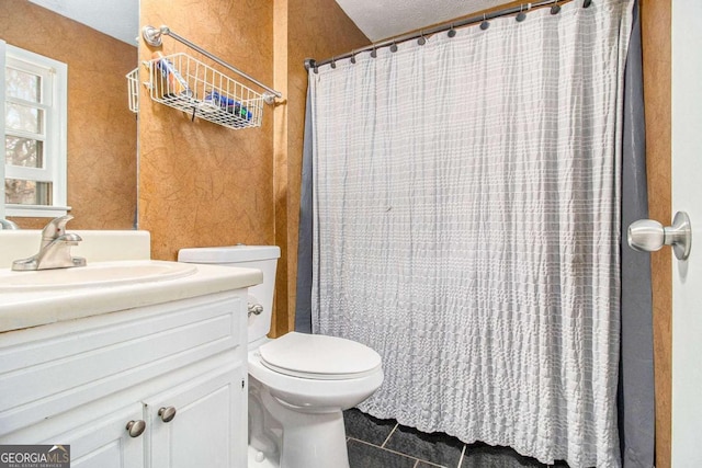 bathroom with vanity, tile patterned flooring, a shower with curtain, and toilet